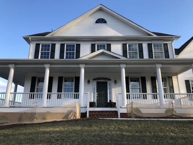 casa en Alam Design Group and Family Builders, LLC. por Alam Design Group and Family Builders, LLC.