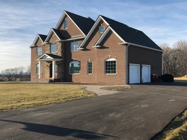 casa en Alam Design Group and Family Builders, LLC. por Alam Design Group and Family Builders, LLC.