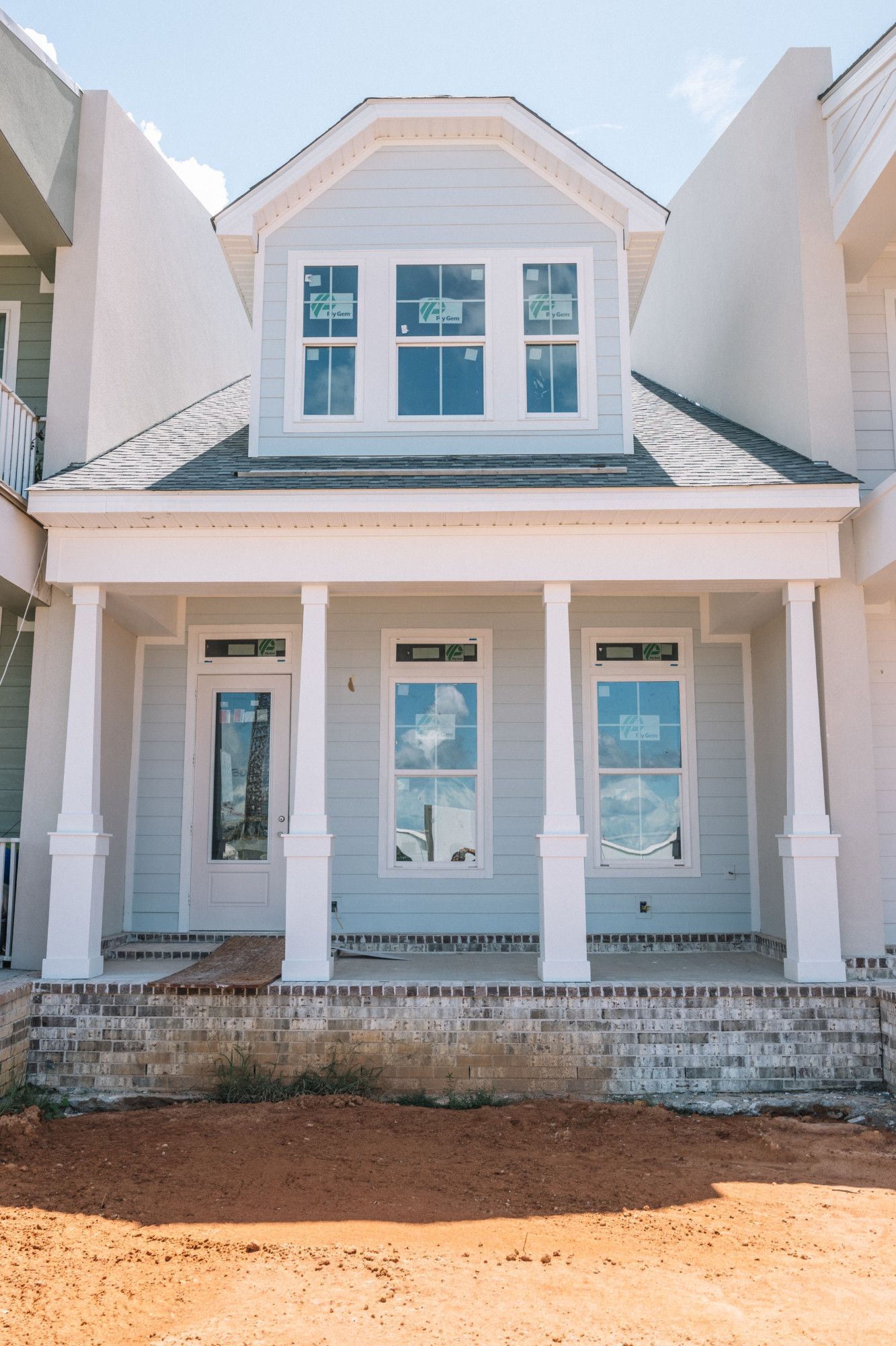 Courtyard At City Dockscourtyard por Elliott Homes, LLC en Biloxi Mississippi