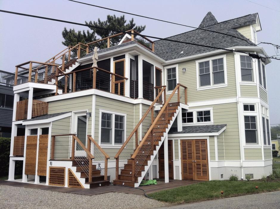 casa en Blue Bee Builders por Blue Bee Builders.