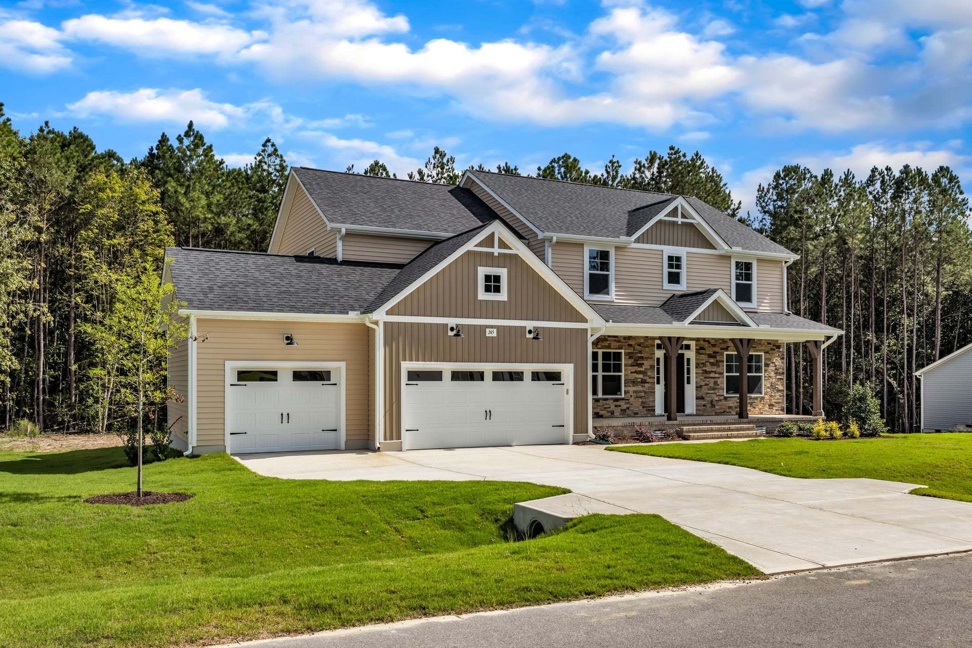 Elevation F with Stone with 3-Car Garage Option