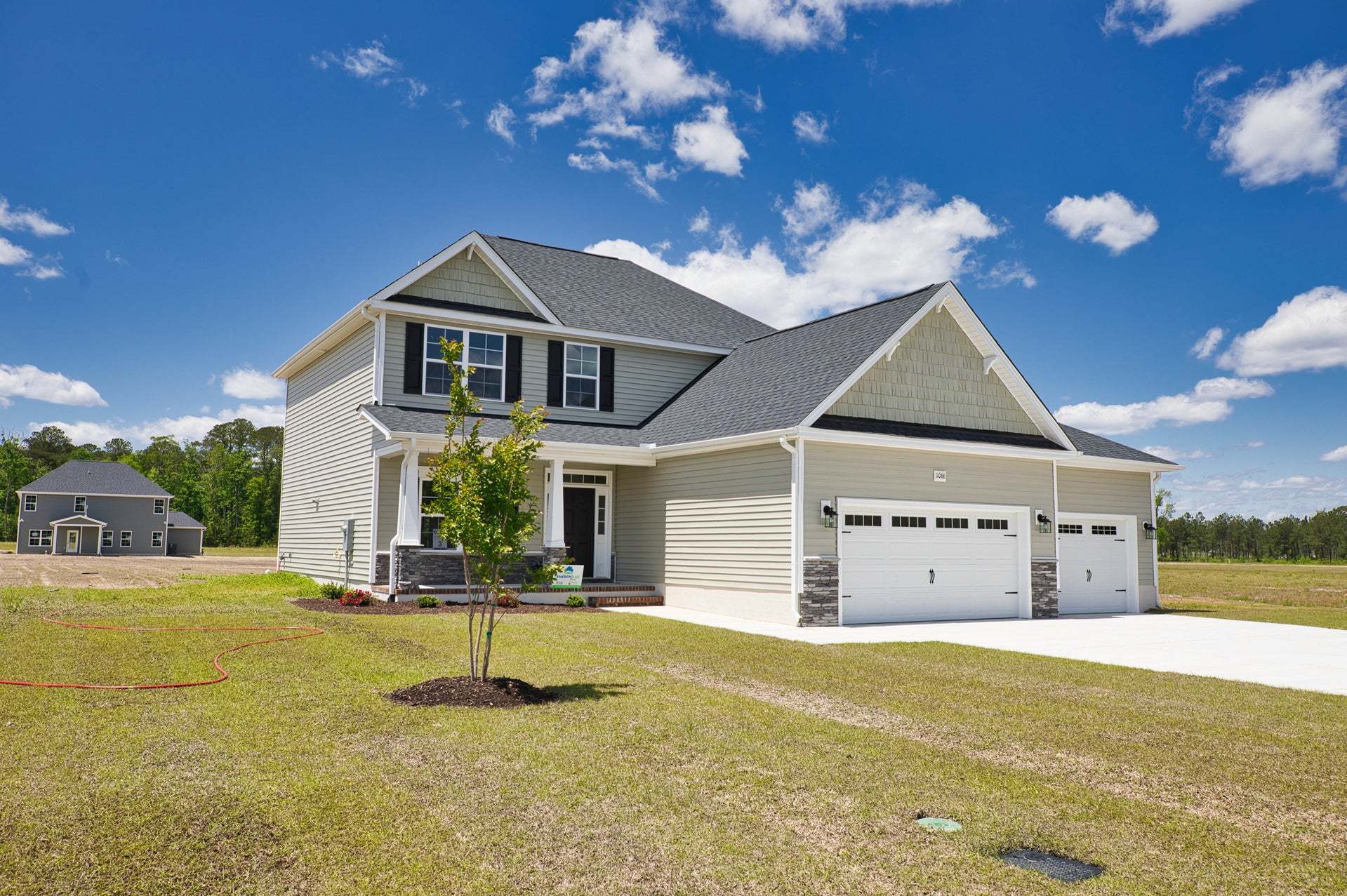 Elevation D with 3-Car Garage Option