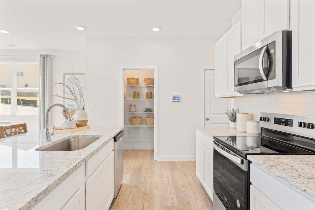 casa en Azalea Square Townhomes por Century Communities