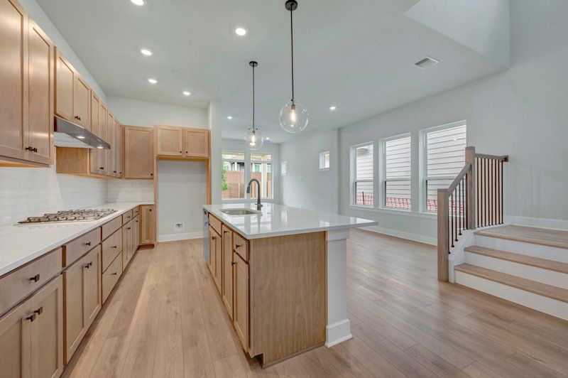 Double Creek Crossing - Quick Move-in Homes - Craftsman por David Weekley Homes en Austin Texas