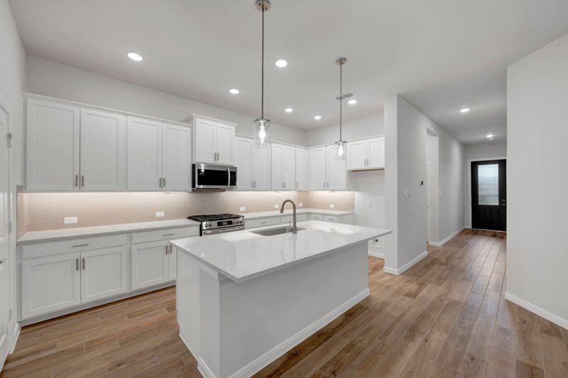 Austin Point - Terrace Collection por David Weekley Homes en Houston Texas