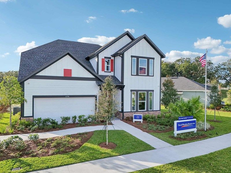 casa en Oakfield at Mount Dora Village Series por David Weekley Homes