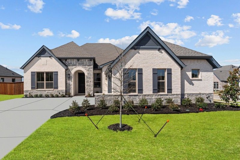 Redden Farms - Manor Series por David Weekley Homes en Dallas Texas