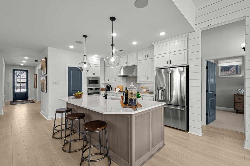 casa en Lakes of River Trails por David Weekley Homes