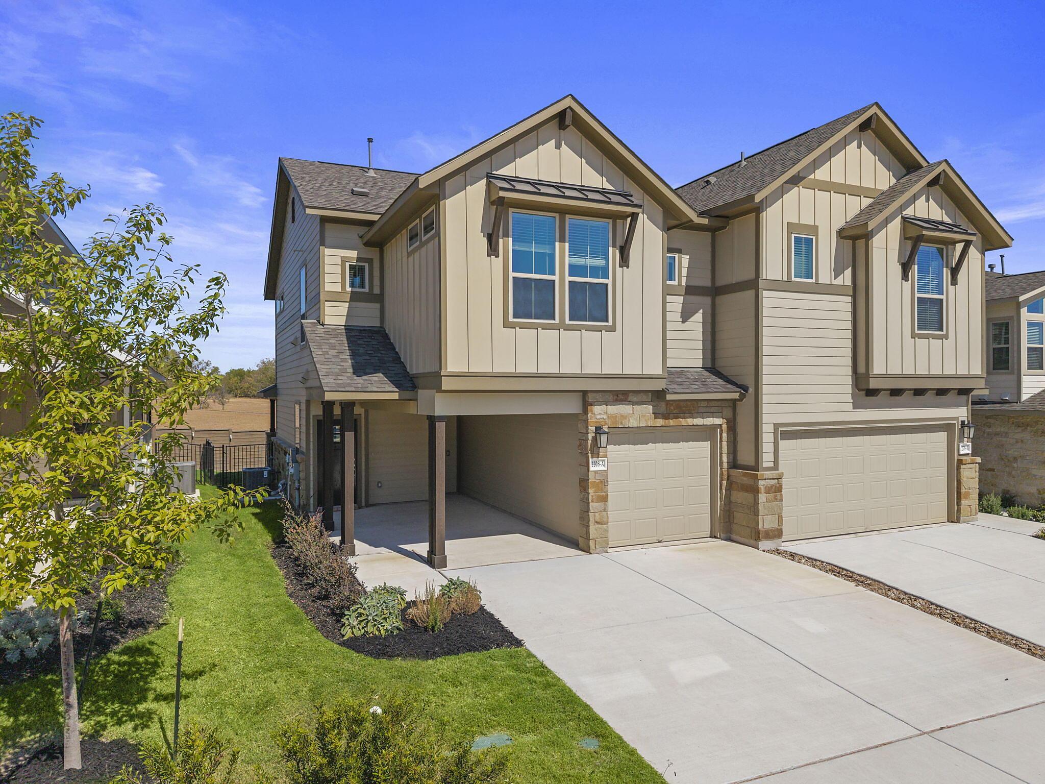 Abbey: Carport - Villas at Rowe: Pflugerville, Texas - Empire Homes