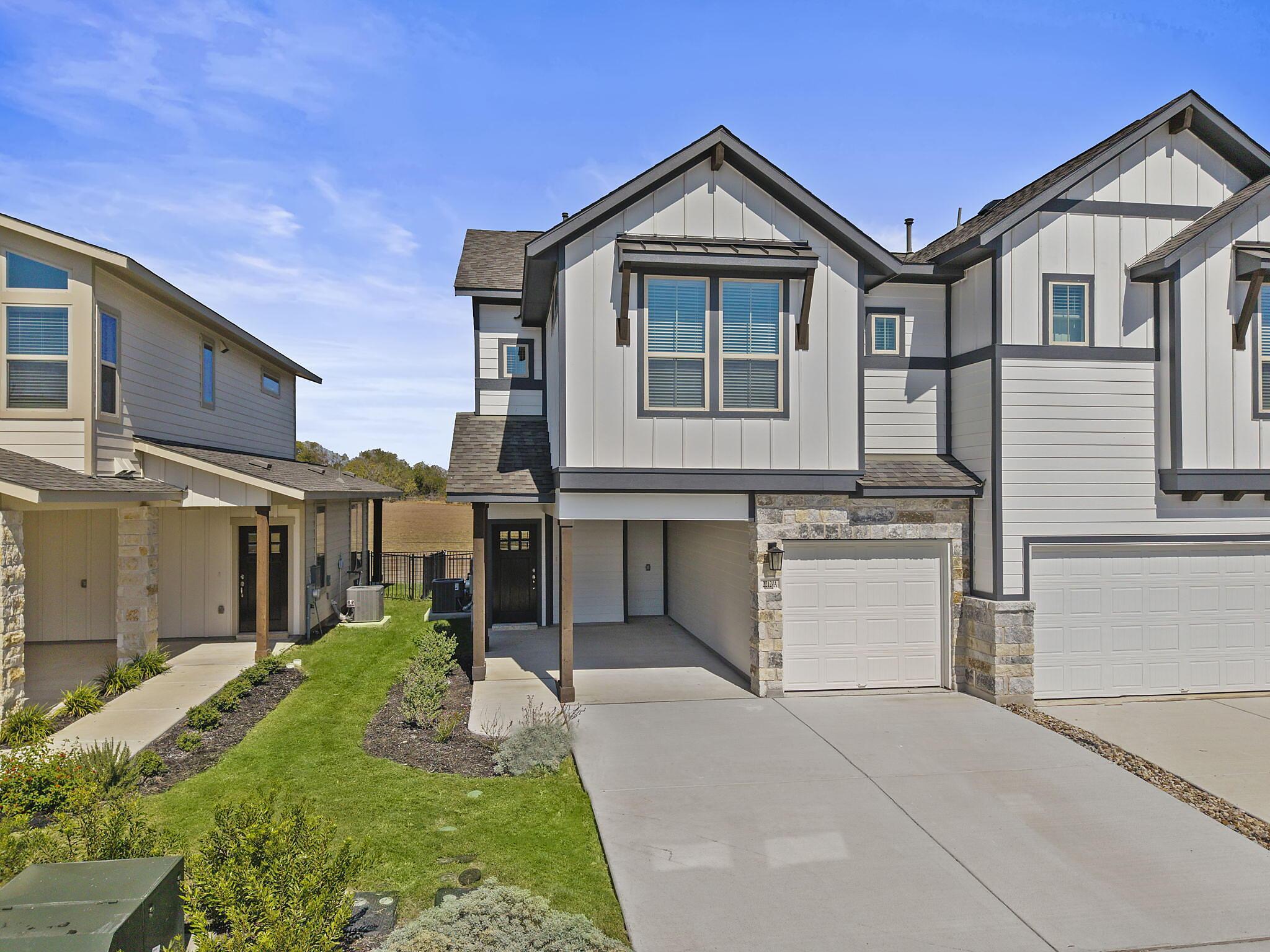 Abbey: Carport - Villas at Rowe: Pflugerville, Texas - Empire Homes