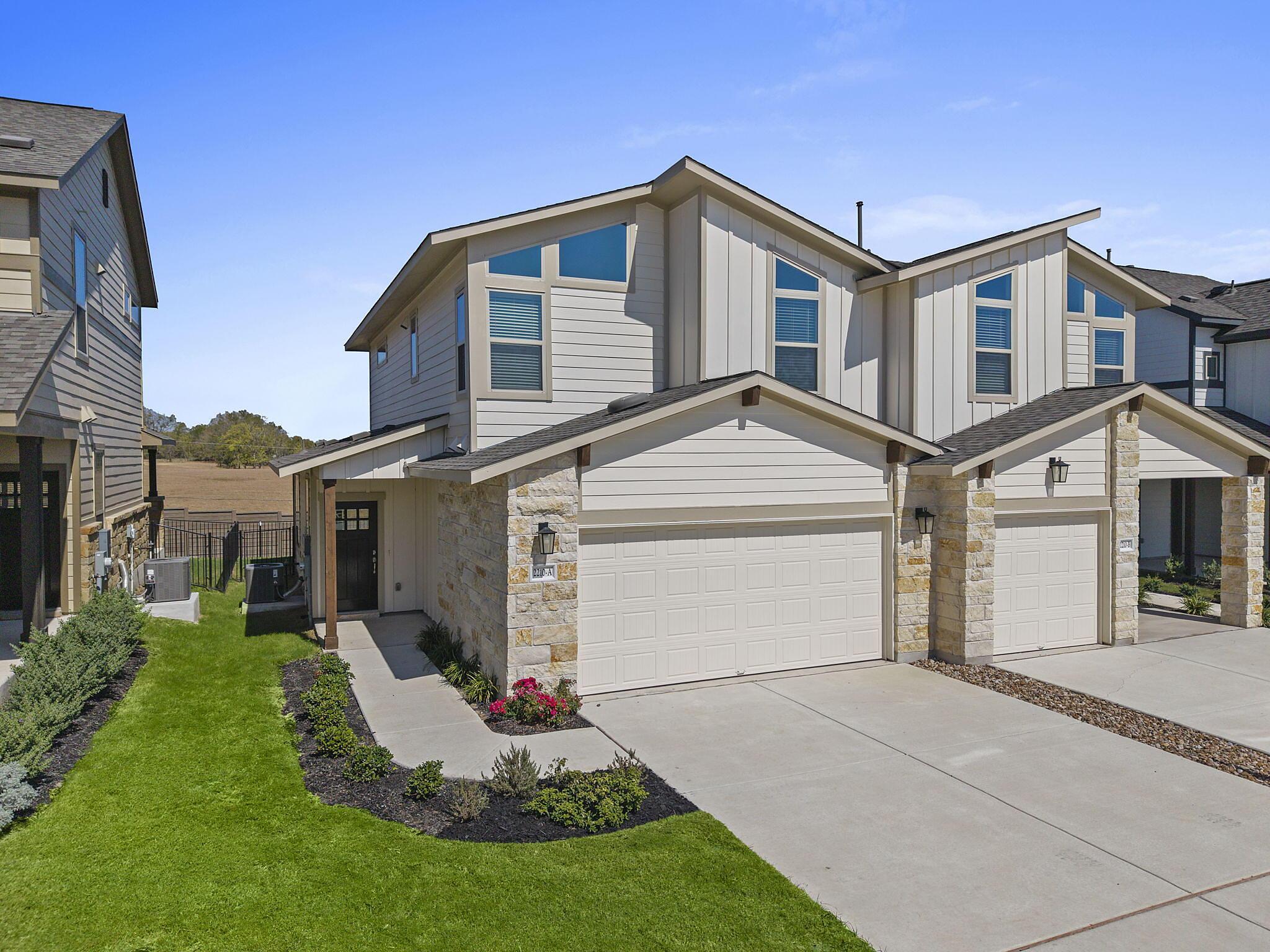 Magnolia: Garage - Villas at Rowe: Pflugerville, Texas - Empire Homes