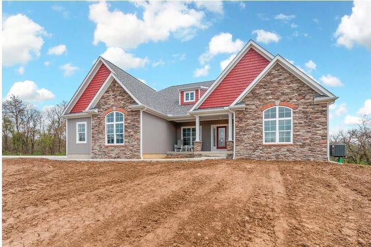casa en Front Porch Custom Builders por Front Porch Custom Builders