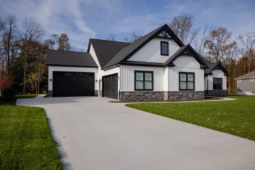 casa en woodhaven preserve por Helen Scott Custom Builders, Inc.