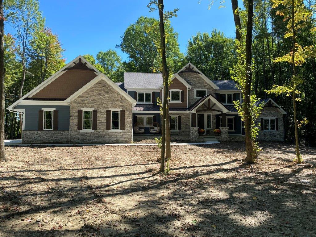 casa en woodhaven preserve por Helen Scott Custom Builders, Inc.