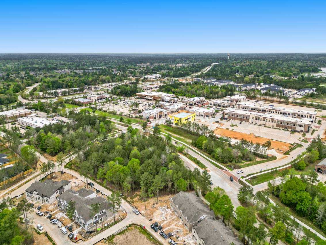 casa en Woodforest Townhomes: Townhomes:  The Patios por Highland Homes