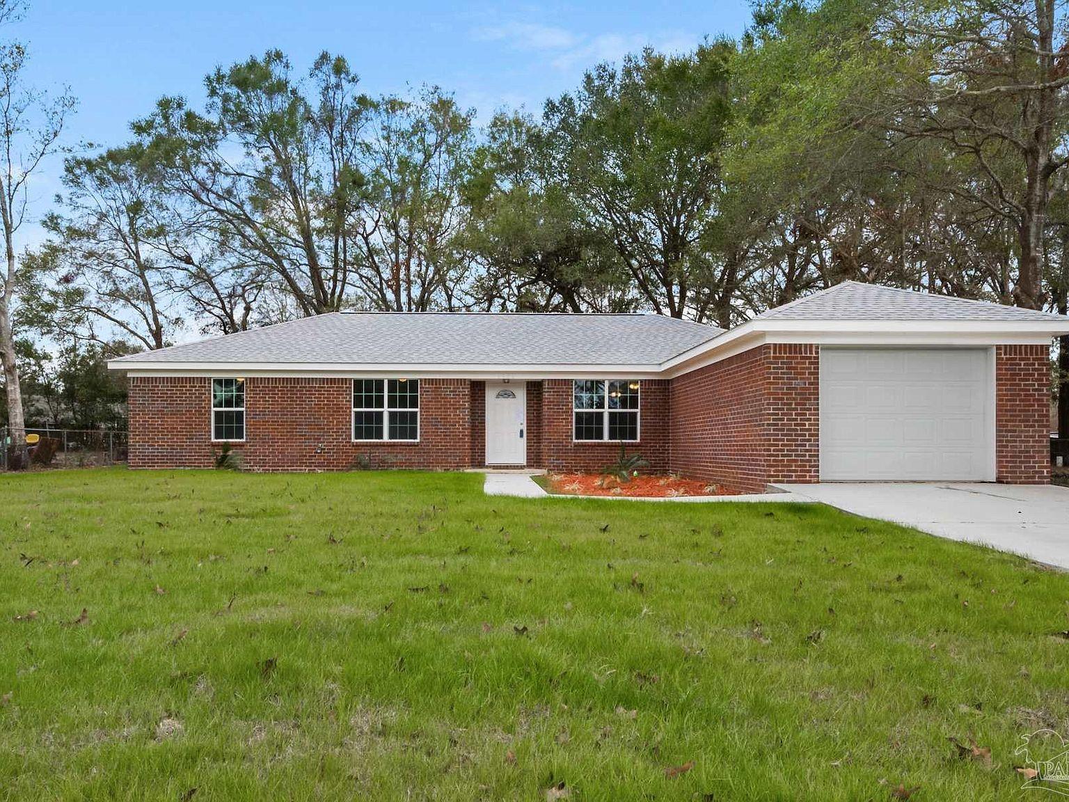 J Chandler General Contractor por J. Chandler Custom Home en Pensacola Florida