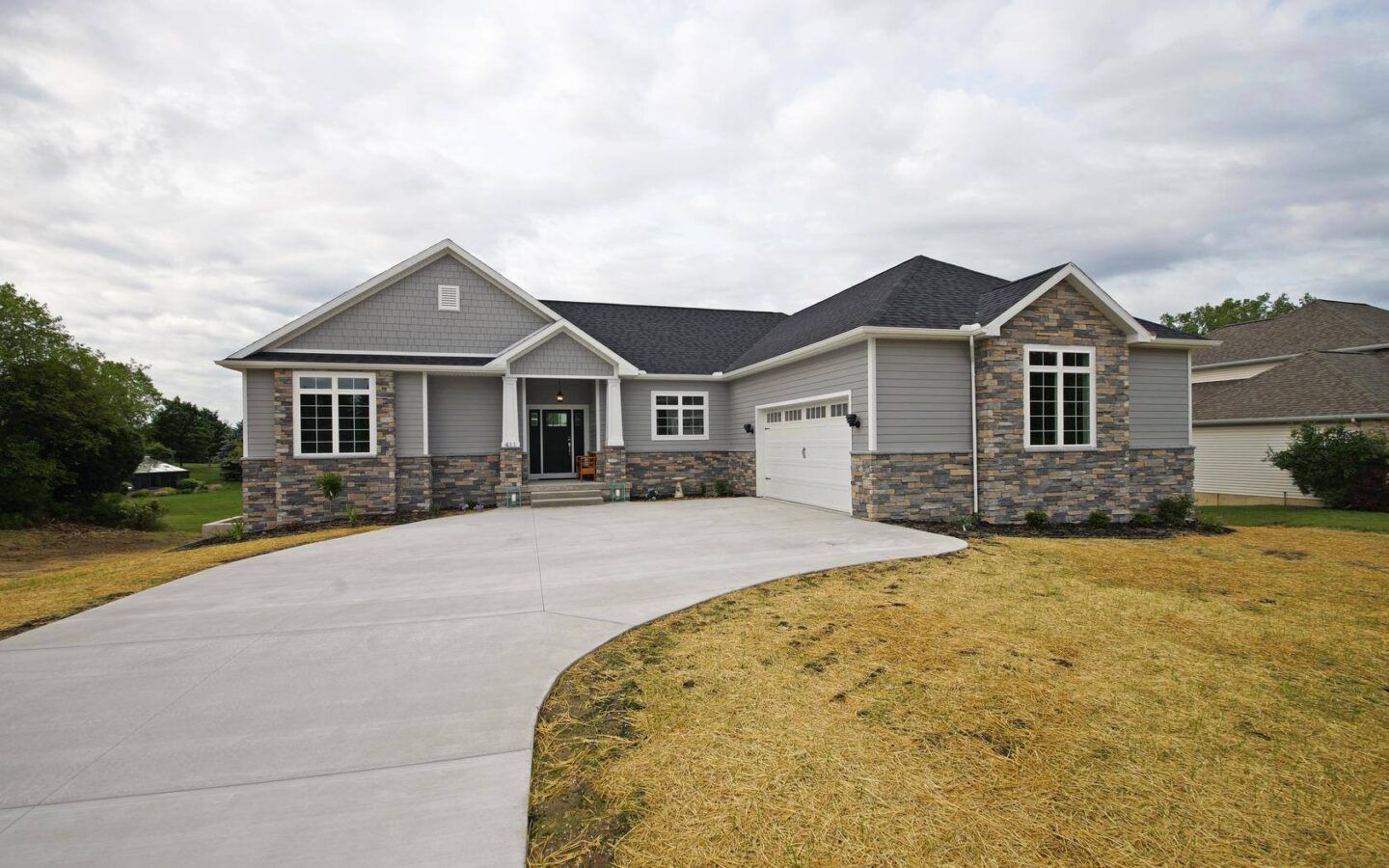 Country Farm Estates por James Edward Builders, Inc. en Lansing Michigan