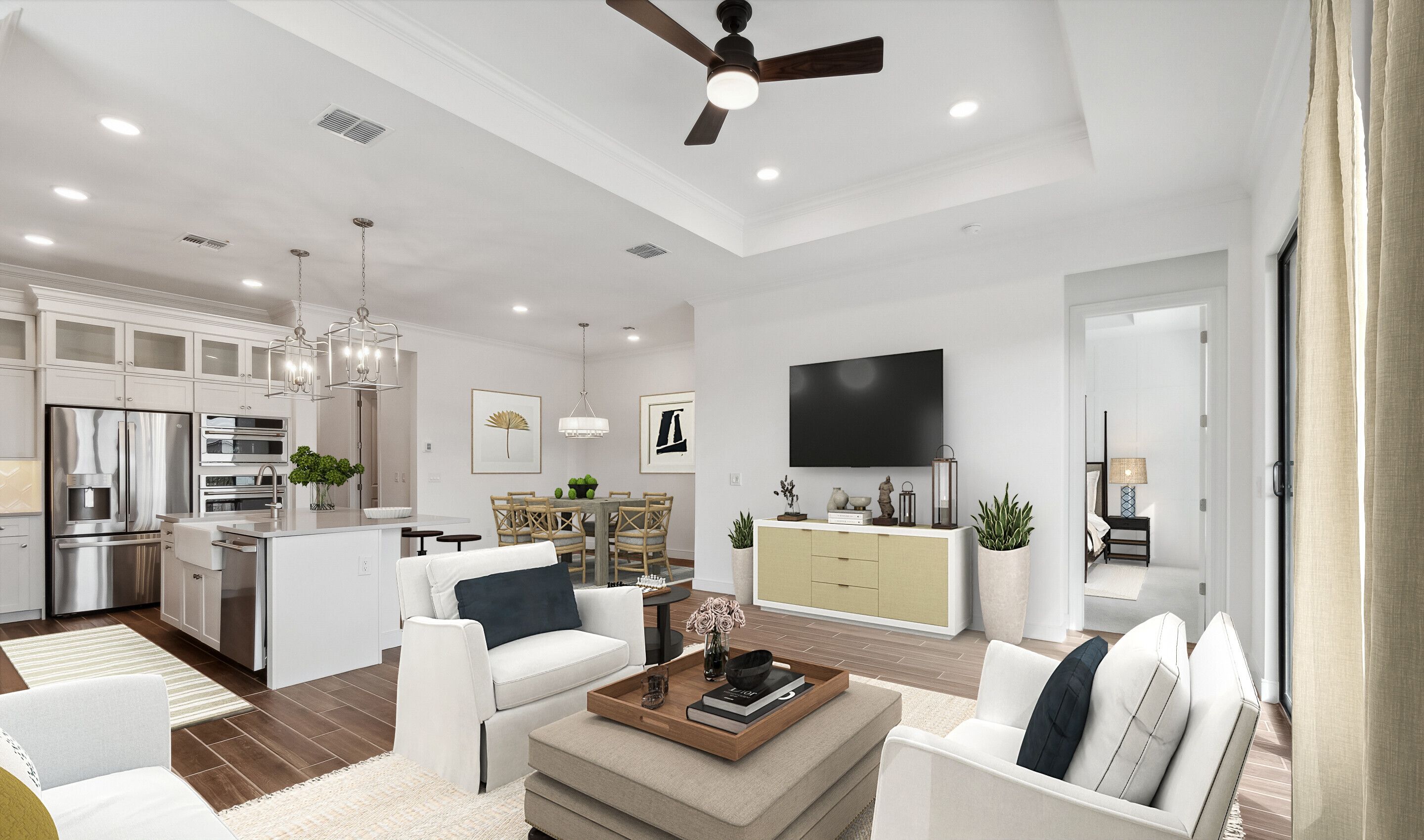 Great room with tray ceiling and luxurious flooring