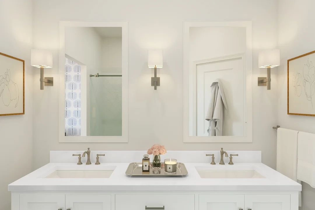 Primary bath with white-framed mirrors