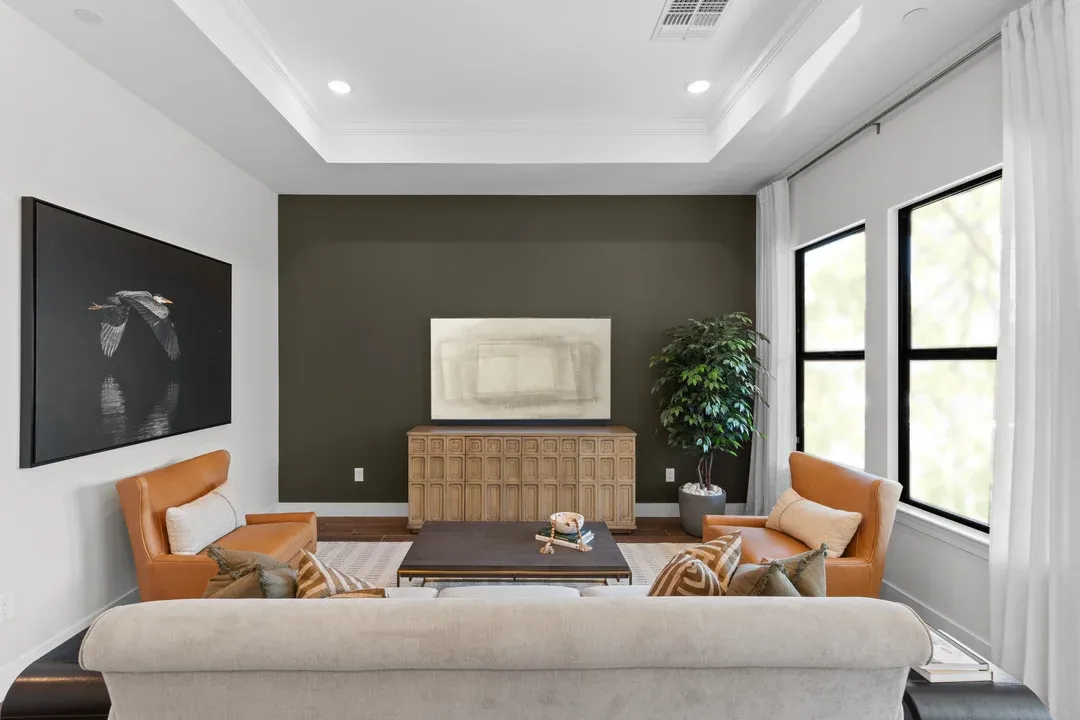 Great room with coffered ceiling and gorgeous tile