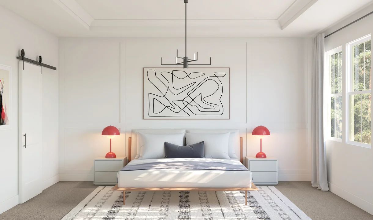 Primary suite with tray ceiling and feature wall