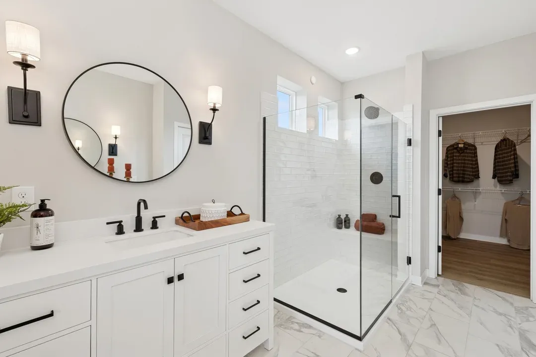 Primary bath with glass shower enclosure