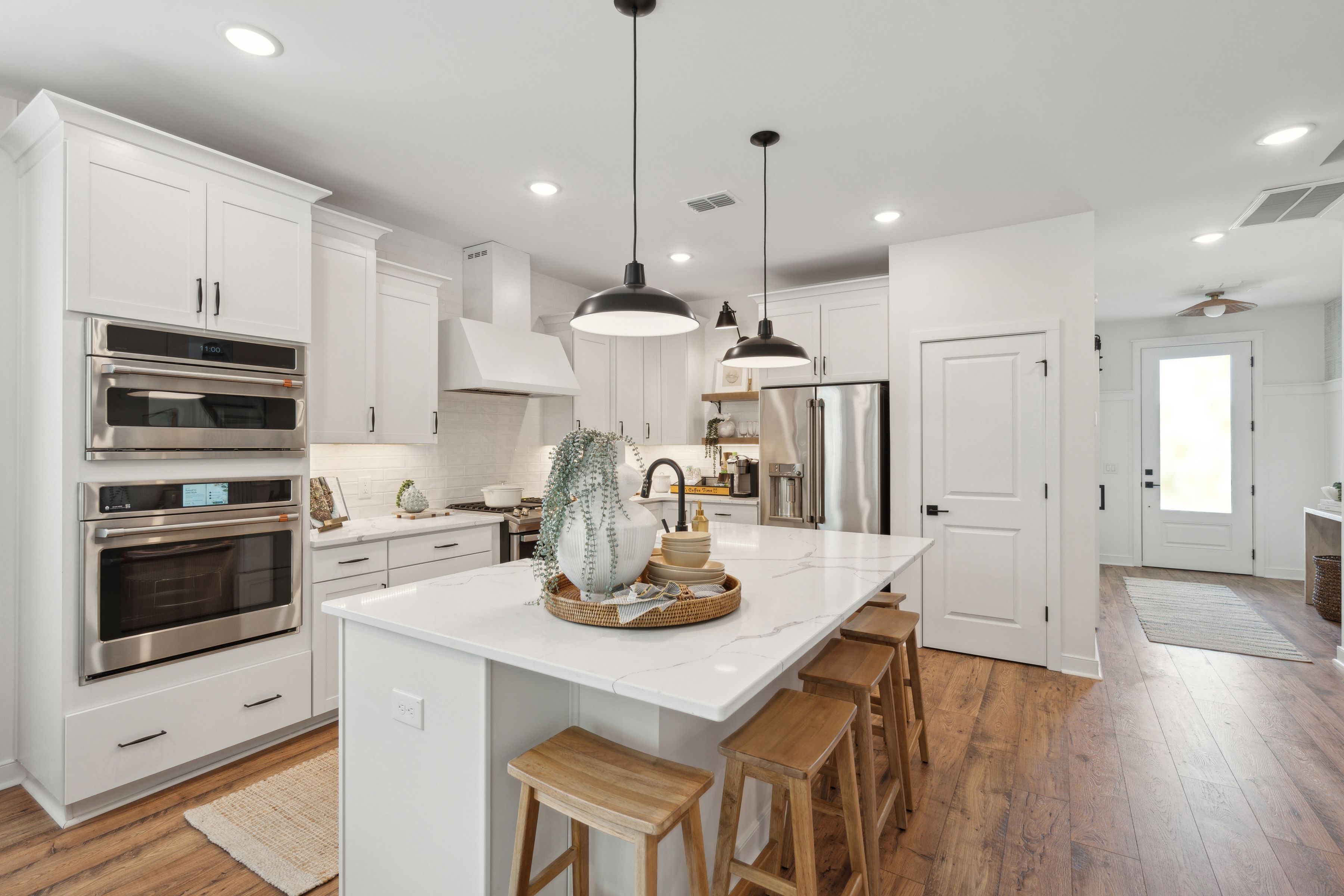 Kitchen with pendant lights over island