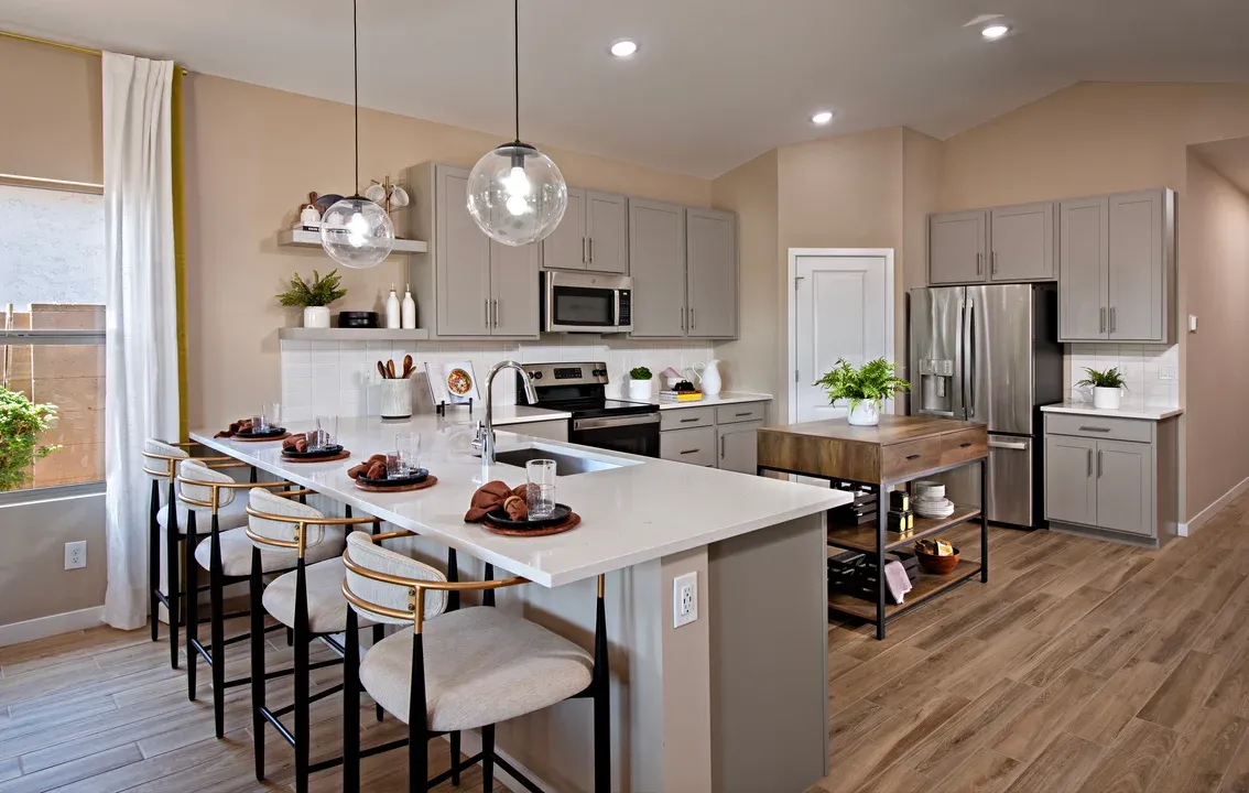 Kitchen with peninsula island and pendant lighting