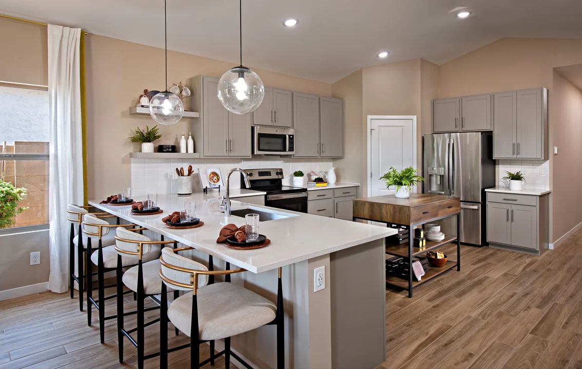 Kitchen with peninsula island and pendant lighting
