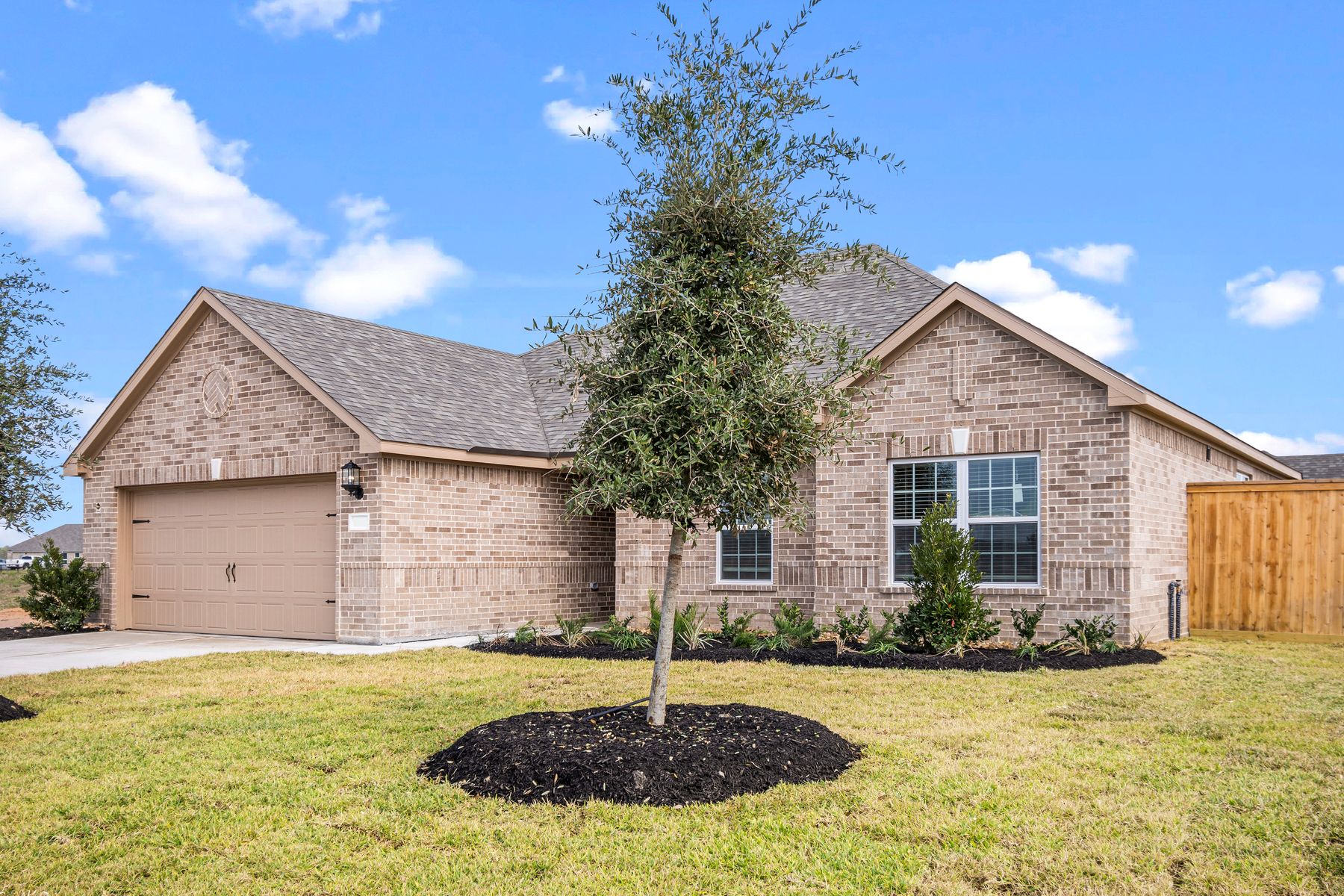 The Hendrie is a single story home with brick.