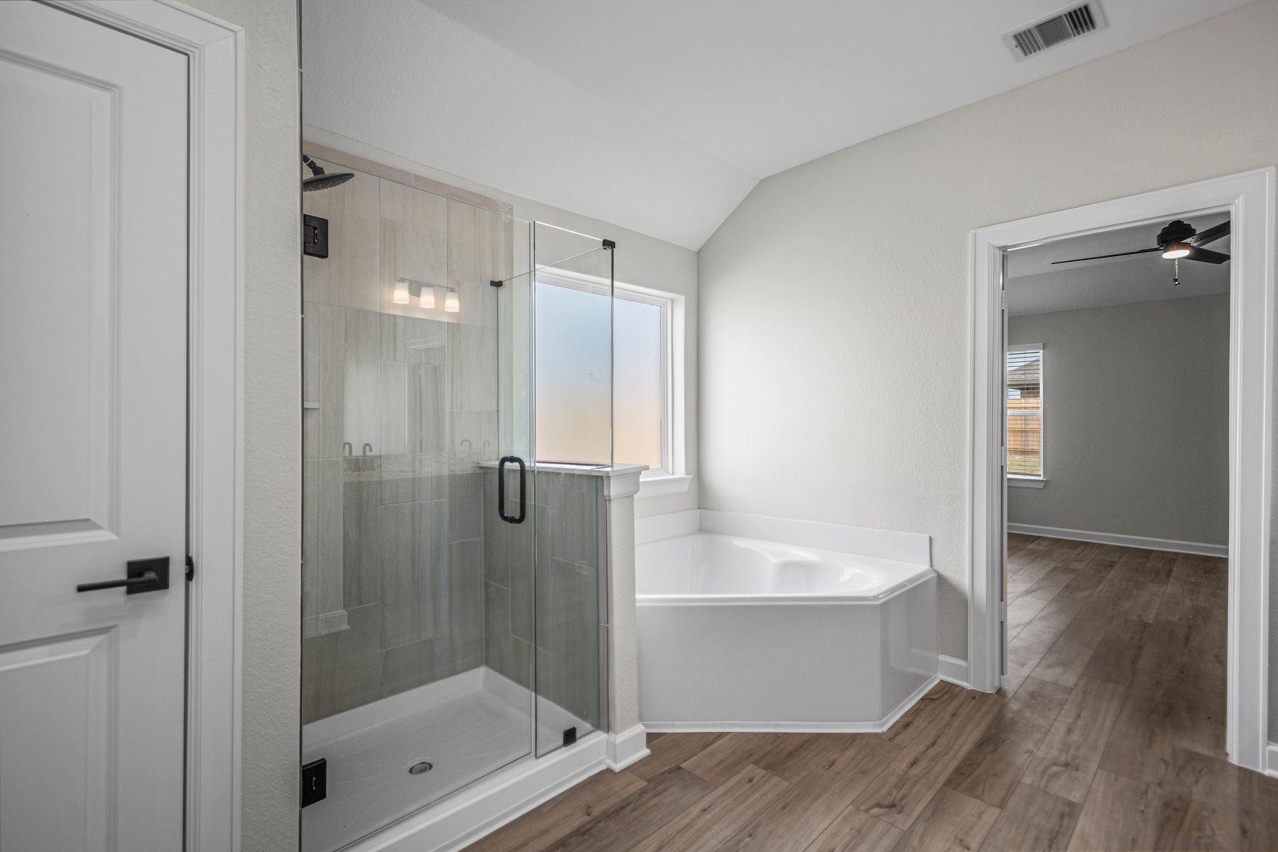 The step in shower and soaking tub of the master bathroom!
