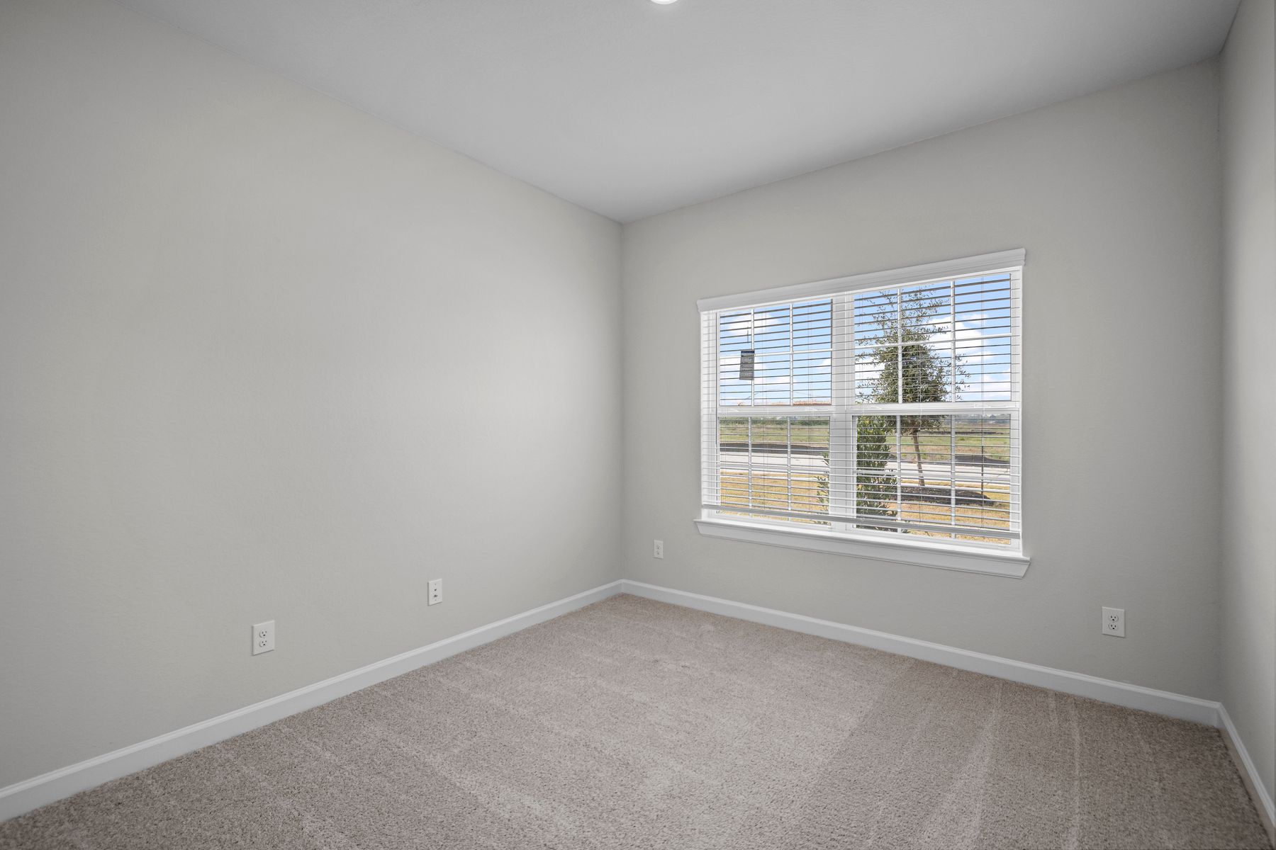 The master bathroom has a large vanity and step in shower!