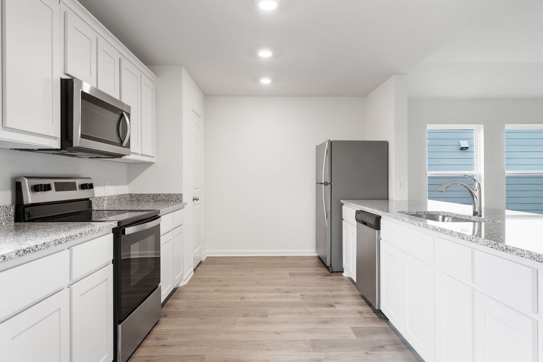 The kitchen of the Reed  has energy-efficient appliances.