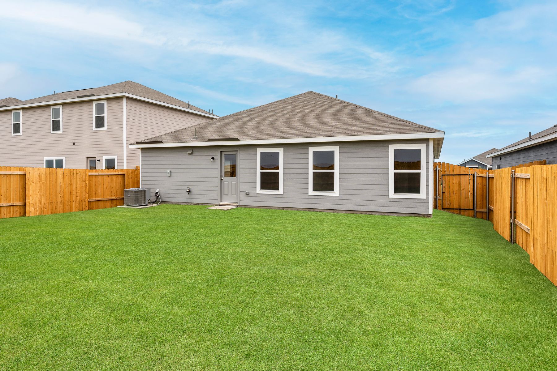 The back yard of the Reed is fully fenced-in.