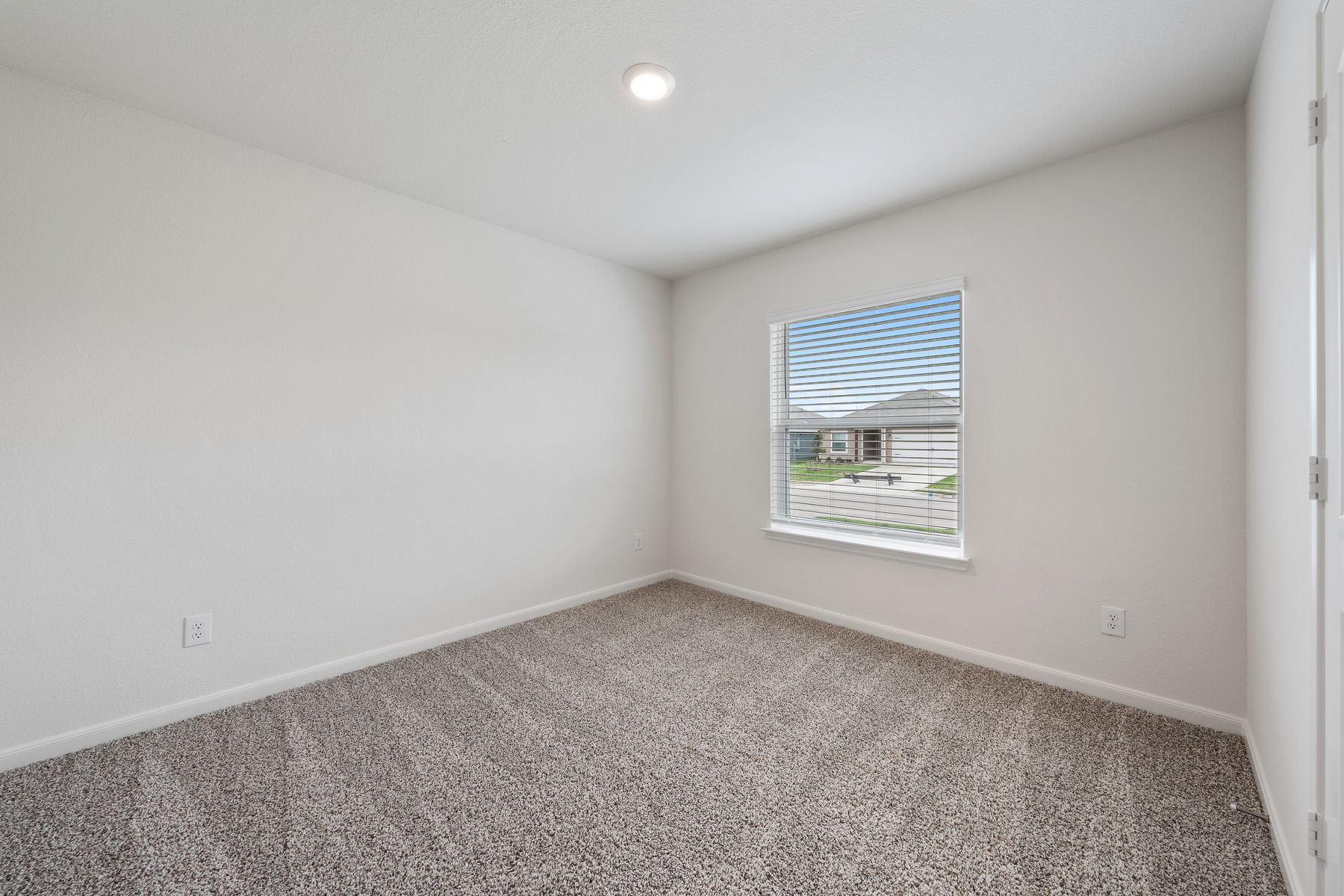 The secondary bedrooms are a great space for a child's bedroom or a guest room.