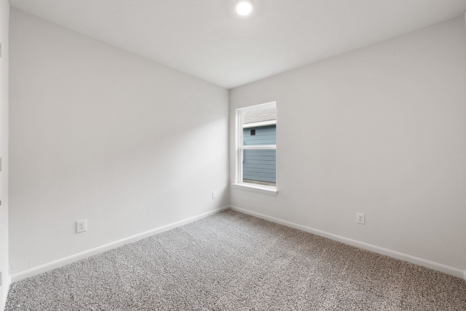 The secondary bedrooms are a great space for a child's bedroom or a guest room.