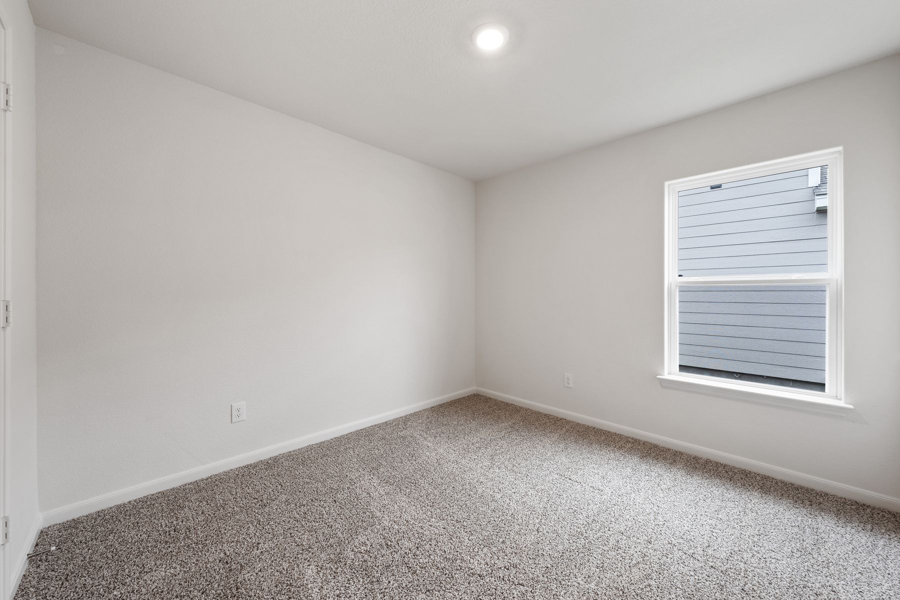 The secondary bedrooms are a great space for a child's bedroom or a guest room.
