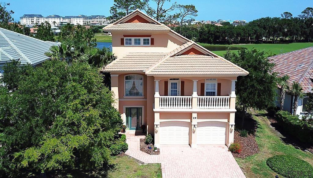 casa en Hammock Beach por Machin Design Builders