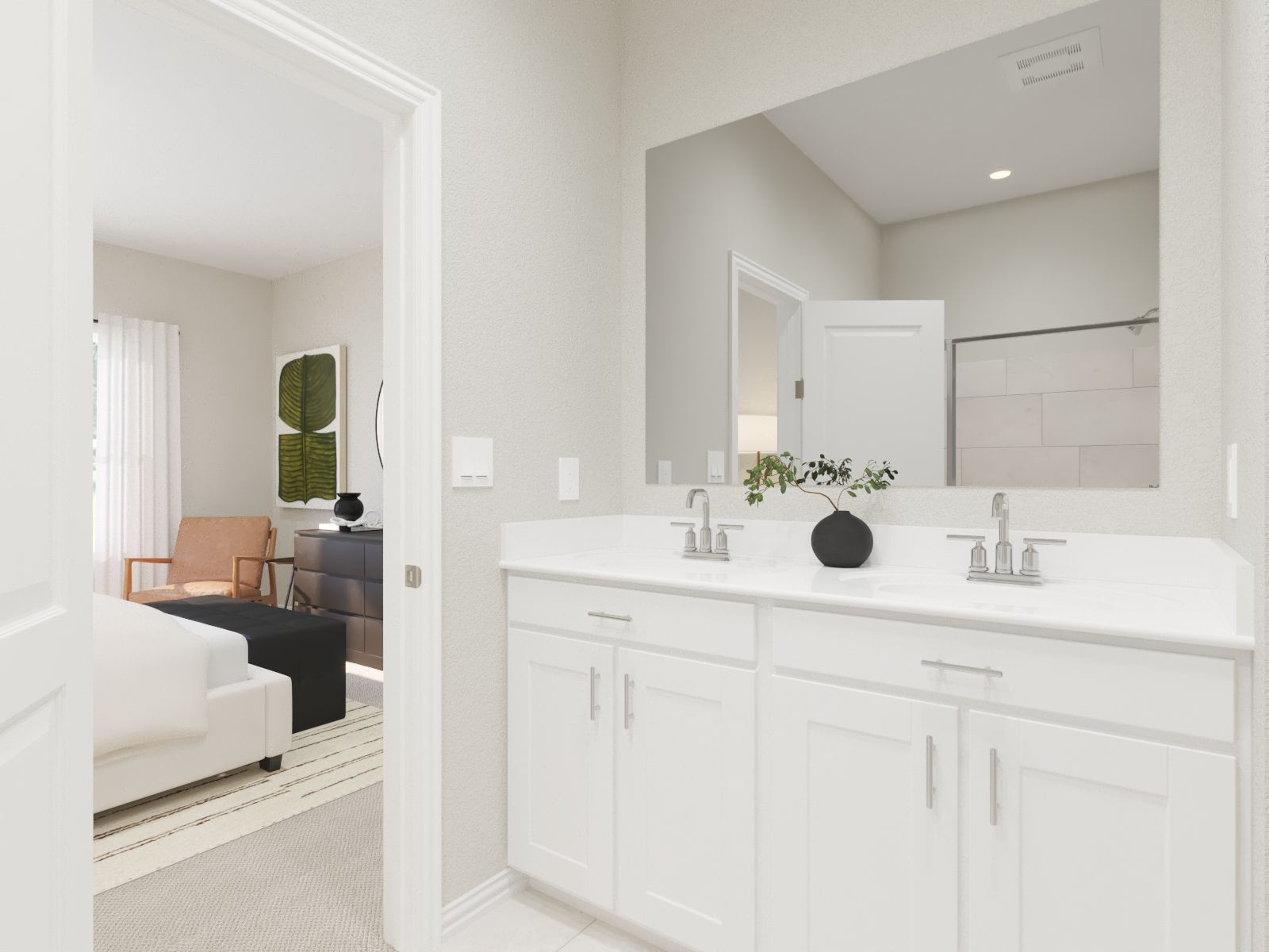 Primary bathroom with double vanity and large walk-in closet