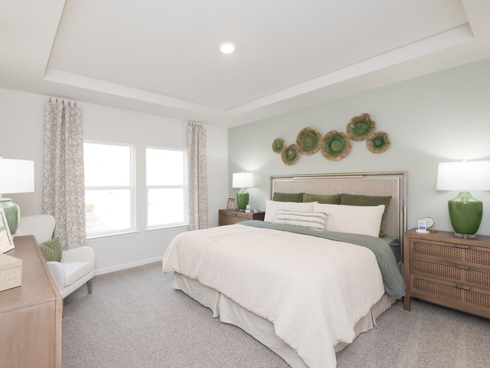 The primary suite is a private retreat to relax and unwind.