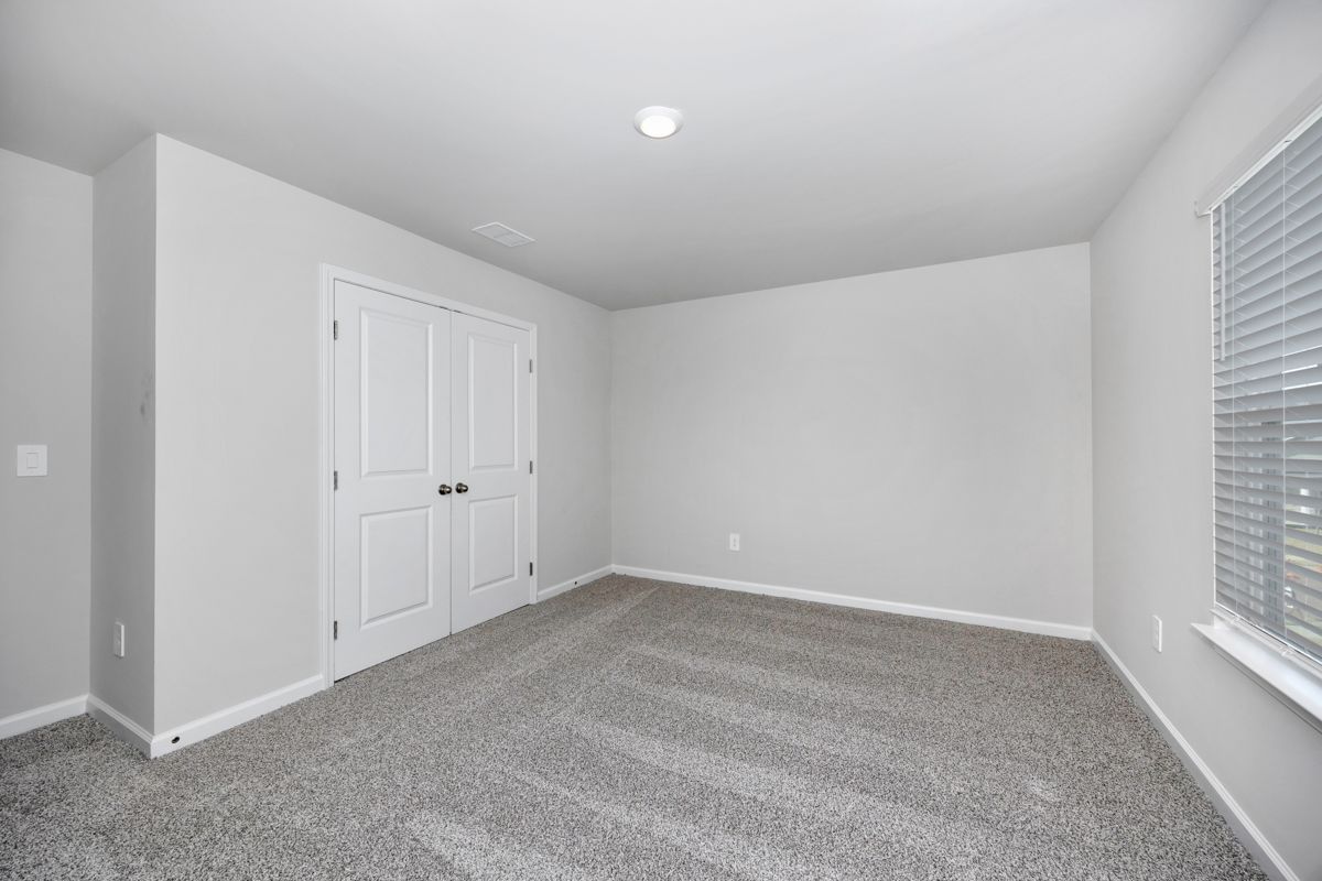 The Carolina floorplan with the Elemental Grey interior package.