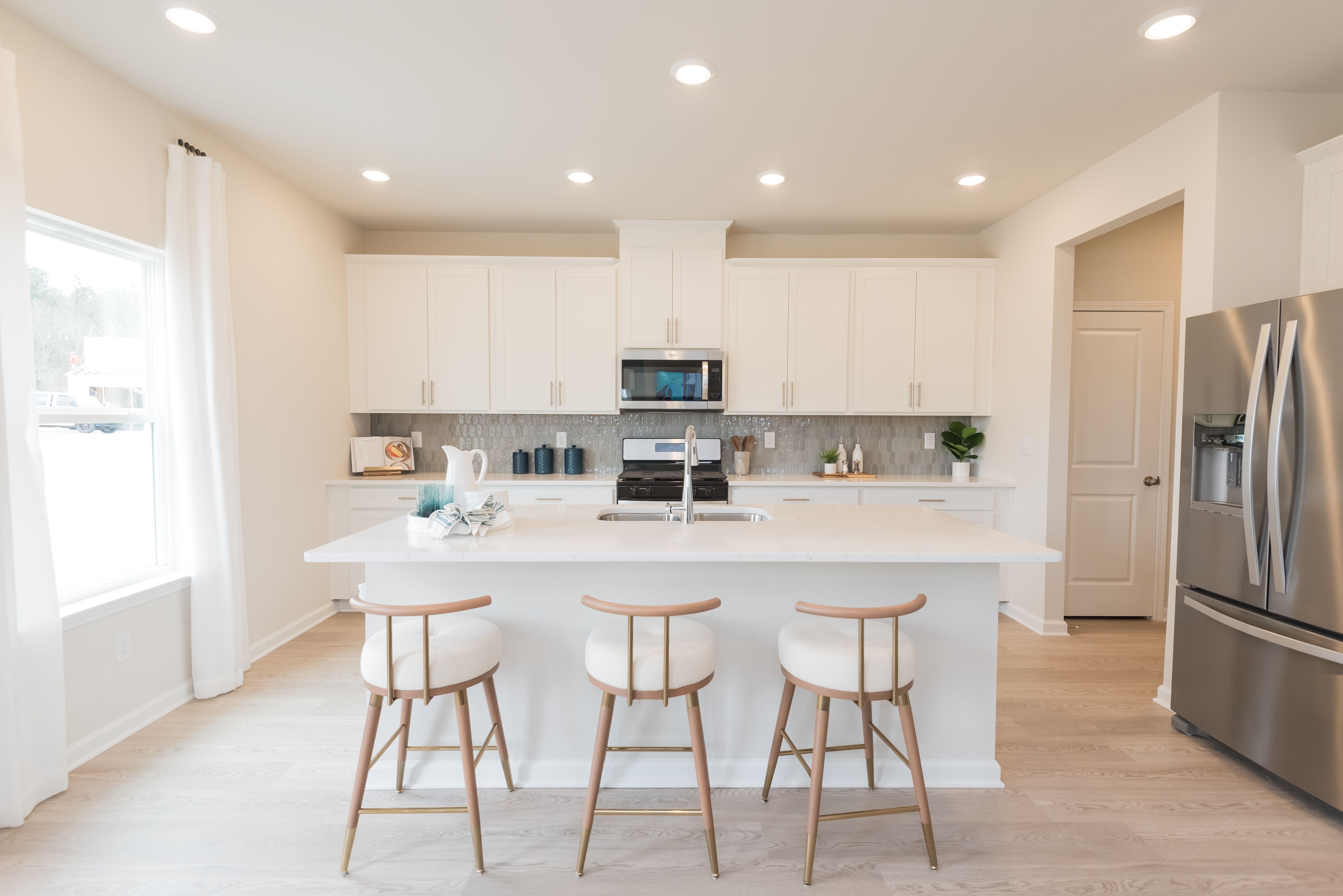 The Taylorsville floorplan with the Lush White interior package modeled at Parkside at Grayson.
