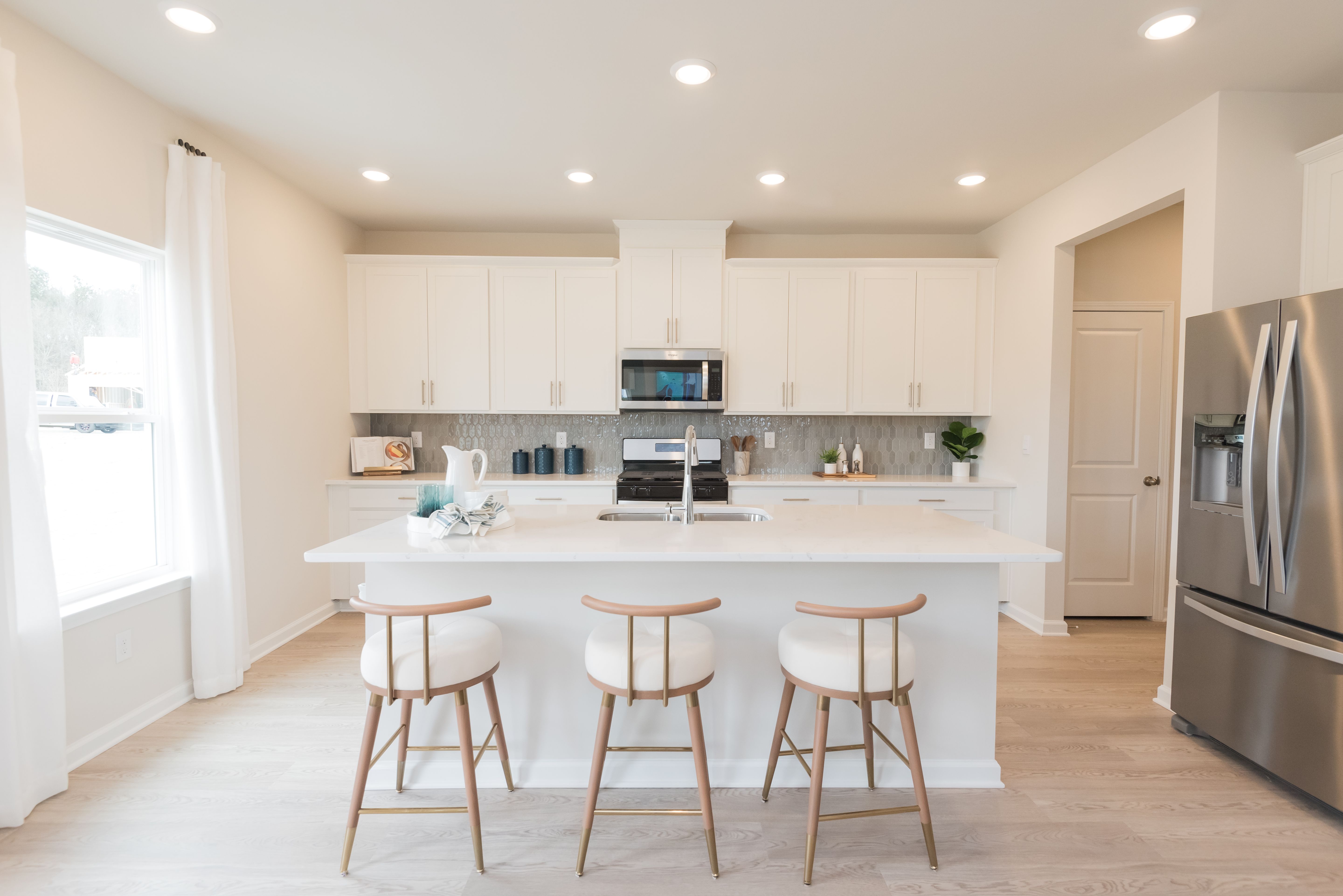 The Taylorsville floorplan with the Lush White interior package modeled at Parkside at Grayson.