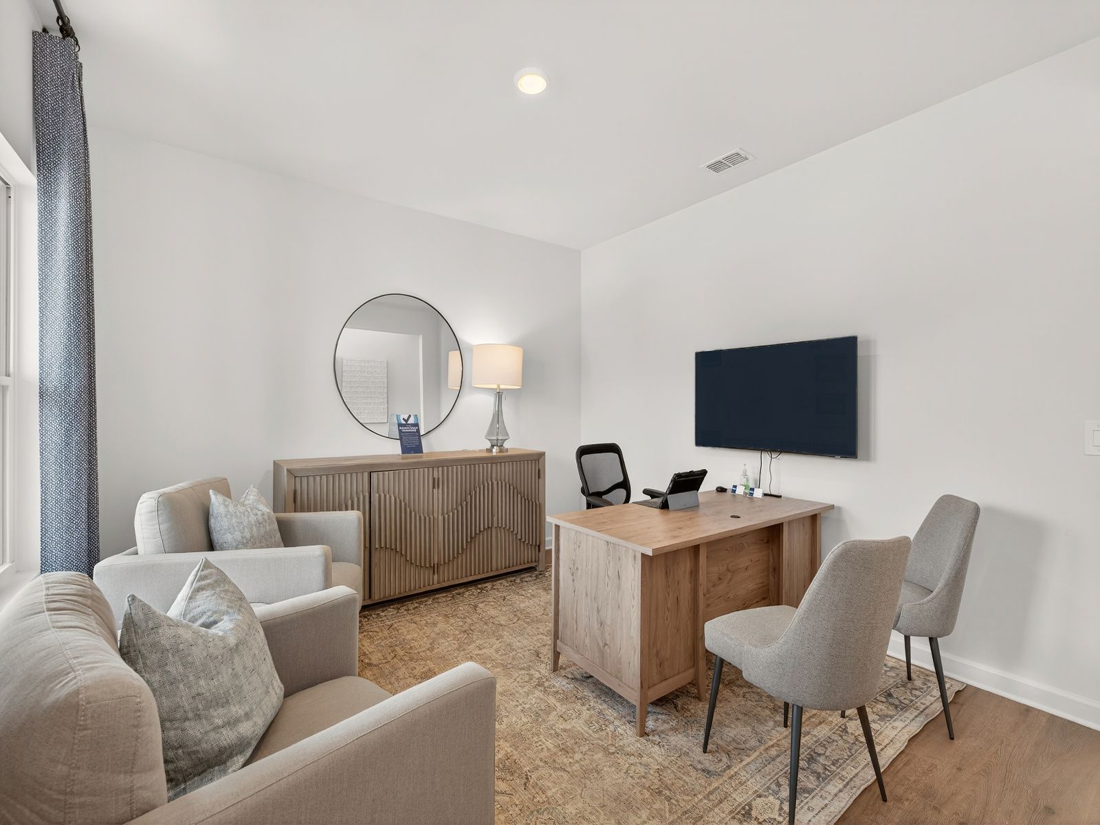 The flex room is located just past the front door for a welcoming entry.
