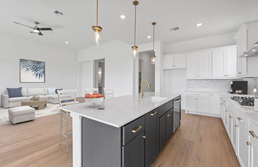 Designer kitchen in the Boling floorplan featuring ample counter space and contemporary finishes.