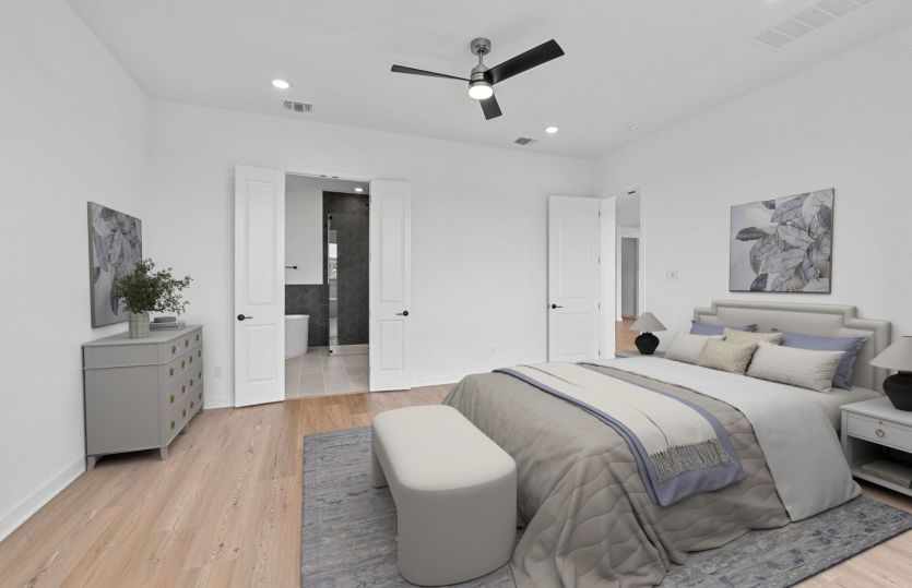 Comfortable guest bedroom with natural light and versatile living space.