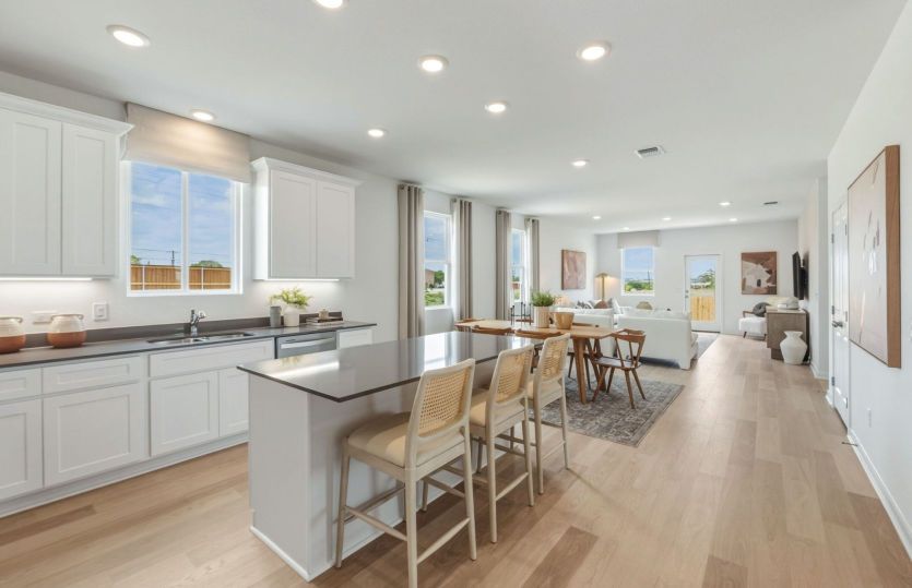 Kitchen Open to the Dining Area and Gathering Space