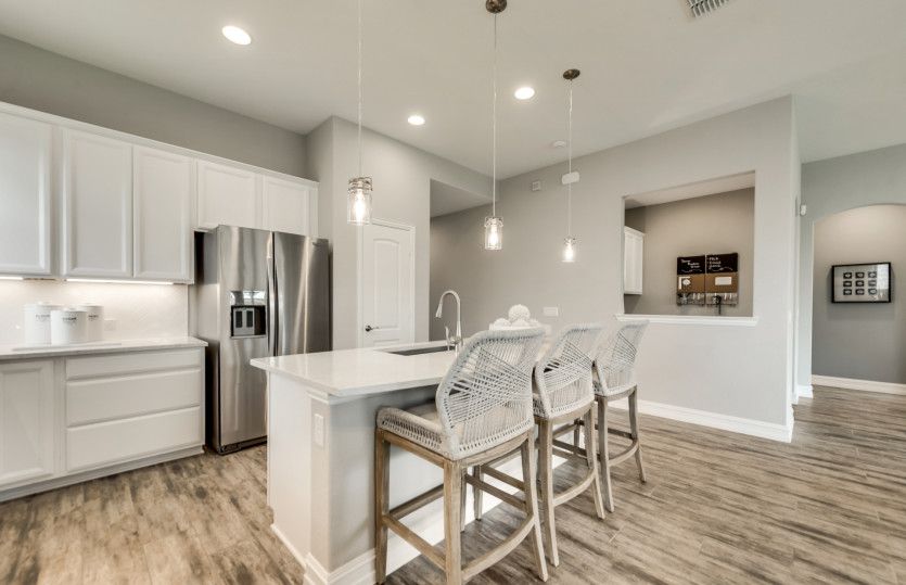 Recessed lighting throughout kitchen