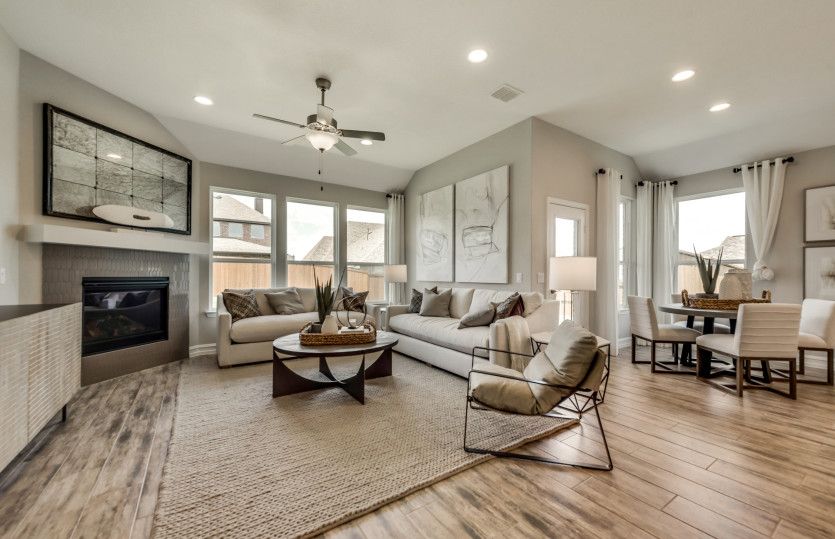 Spacious gathering room with optional fireplace and large windows