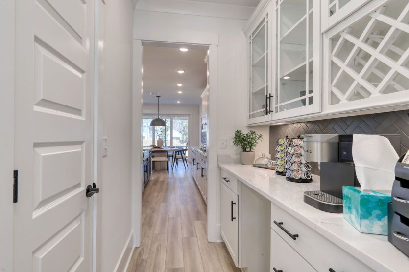 Convenient butler’s pantry with extra storage and prep space for entertaining.